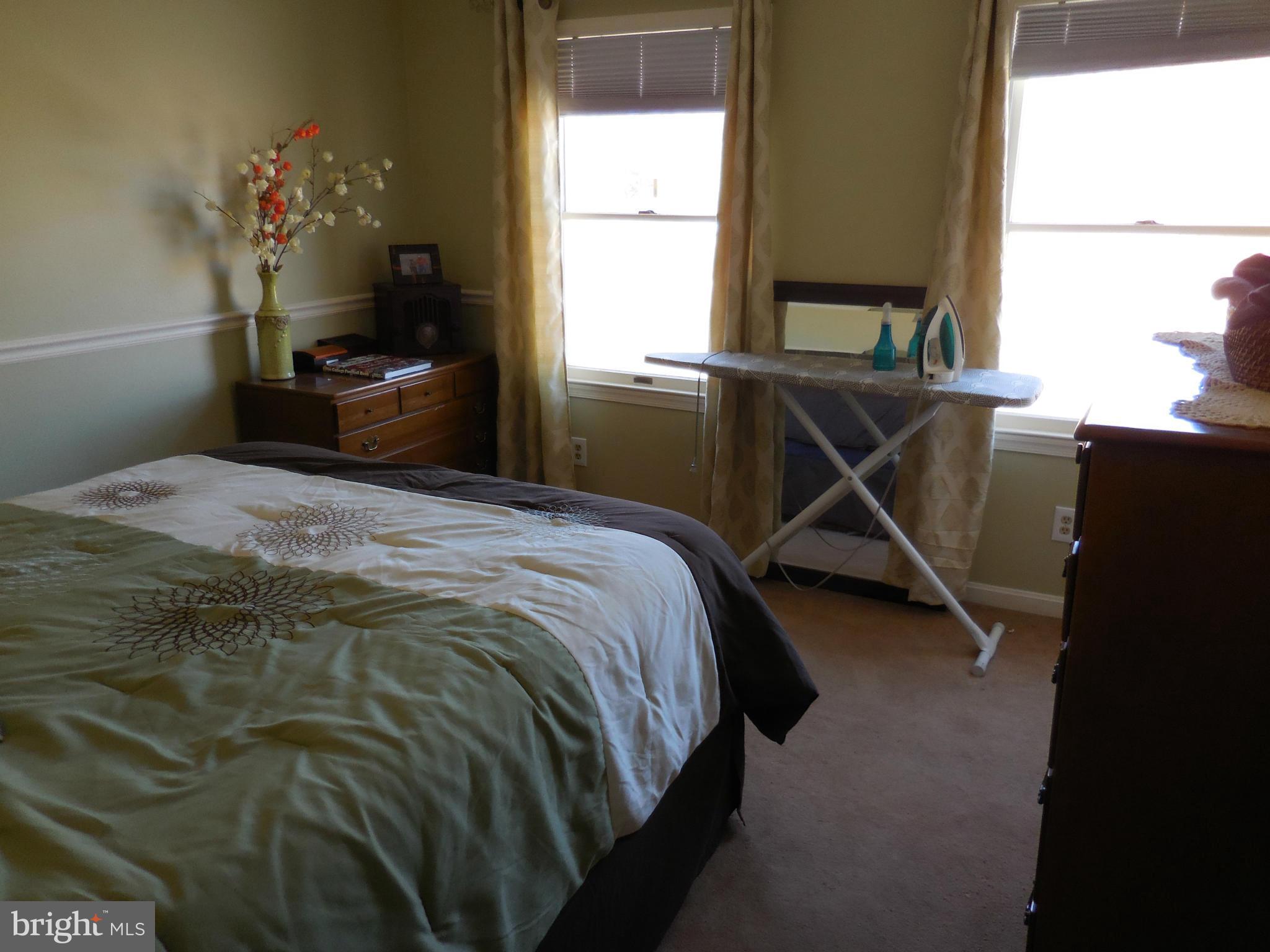 16613 Trenton Road Upperco, MD 21155 - Photo 15 of 15 a bedroom with a bed and window