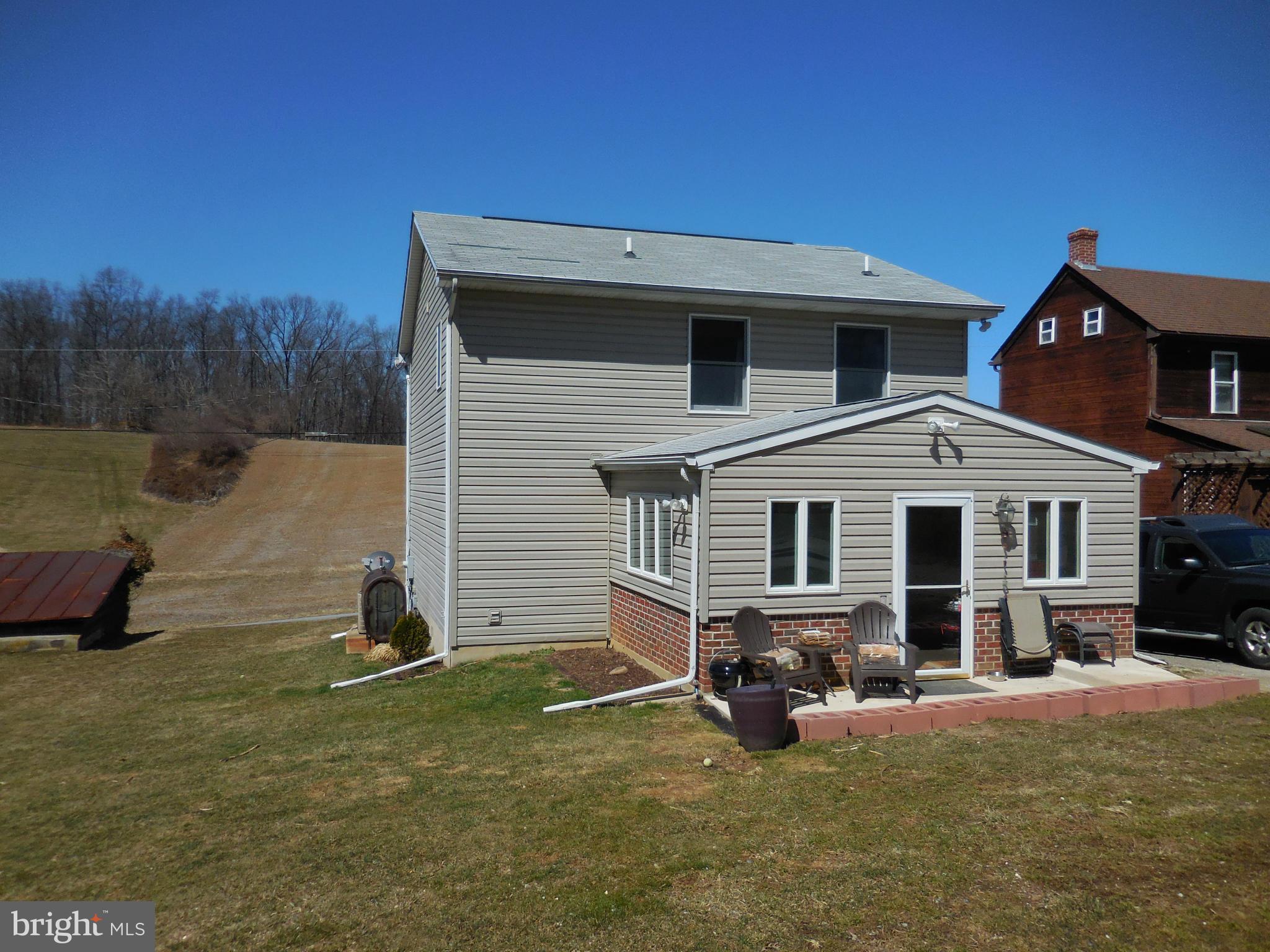 16613 Trenton Road Upperco, MD 21155 - Photo 3 of 15 a view of a house with a yard