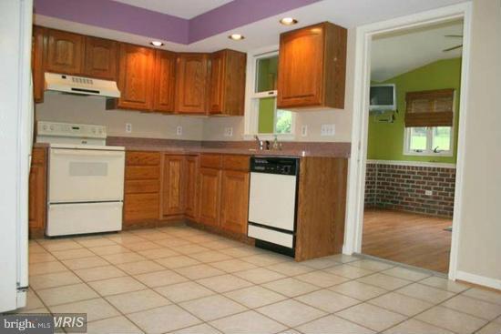 16613 Trenton Road Upperco, MD 21155 - Photo 5 of 15 a kitchen with a sink cabinets and appliances