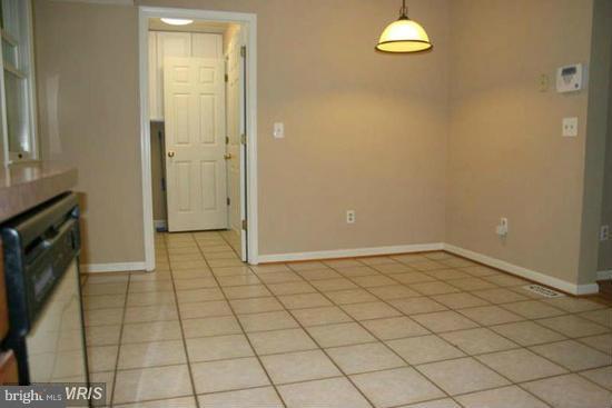 16613 Trenton Road Upperco, MD 21155 - Photo 6 of 15 an empty room with windows