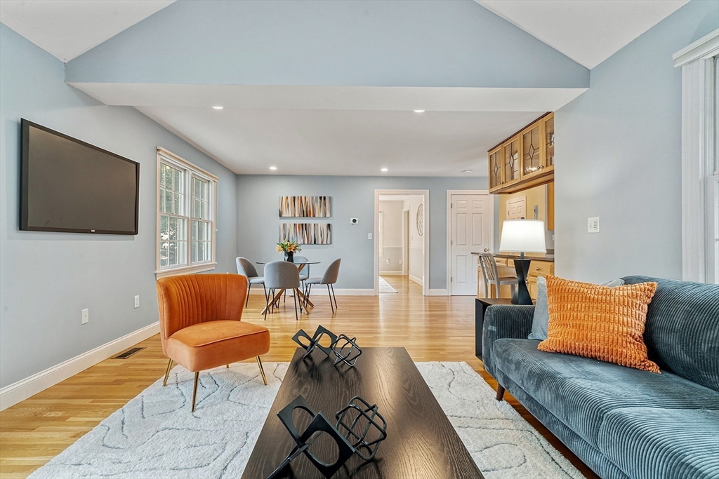 166 Forest Street Winchester, MA 01890 - Photo 14 of 37 a living room with furniture and a flat screen tv