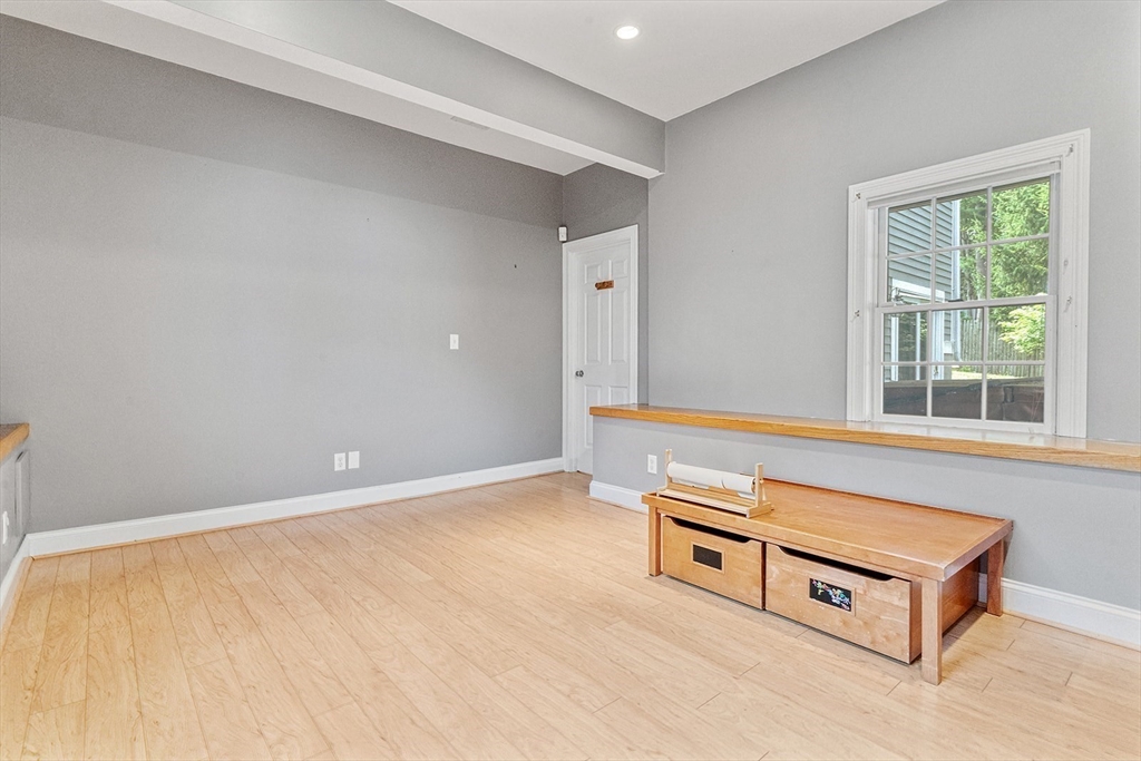 166 Forest Street Winchester, MA 01890 - Photo 30 of 37 a view of an empty room with windows