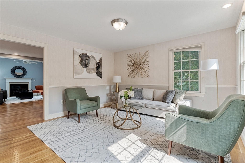 166 Forest Street Winchester, MA 01890 - Photo 4 of 37 a living room with furniture and a window