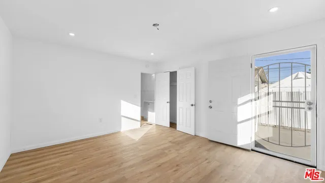 a view of a street with a house