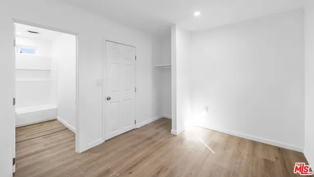 a view of small space with wooden floor