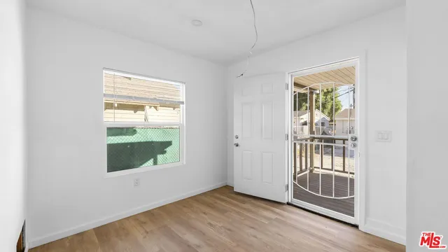 a room with a sink and a mirror