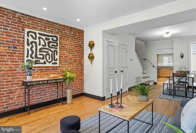 a view of a livingroom with furniture and a rug
