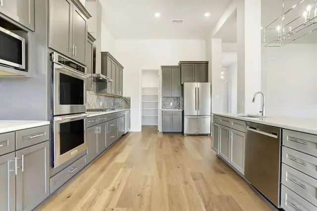 Gorgeous kitchen open to living room.