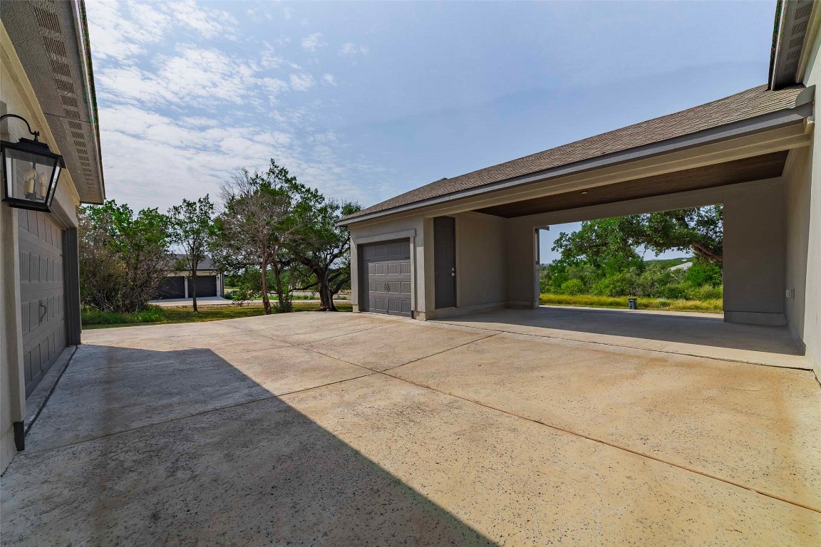 104 Lazy Oak Place Spicewood, TX 78669 - Photo 12 of 40 a view of outdoor space and yard