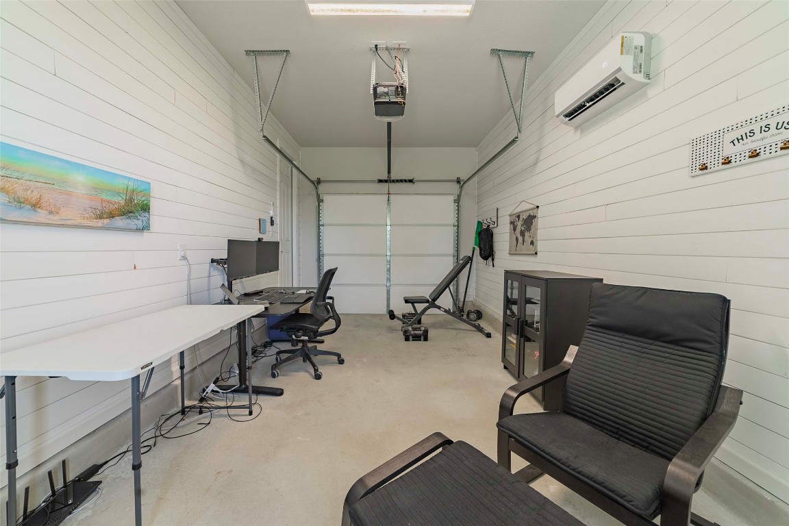 104 Lazy Oak Place Spicewood, TX 78669 - Photo 15 of 40 One-car garage currently used as an office.