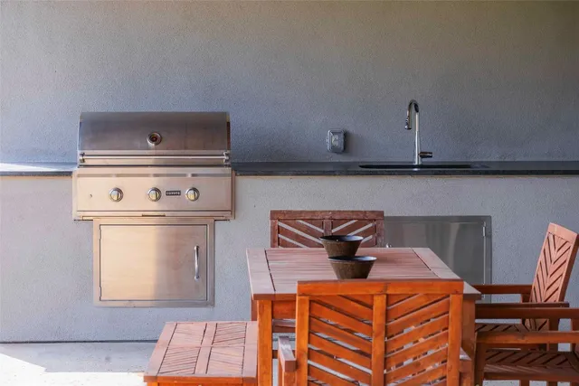a close view of a stove a microwave and cabinets