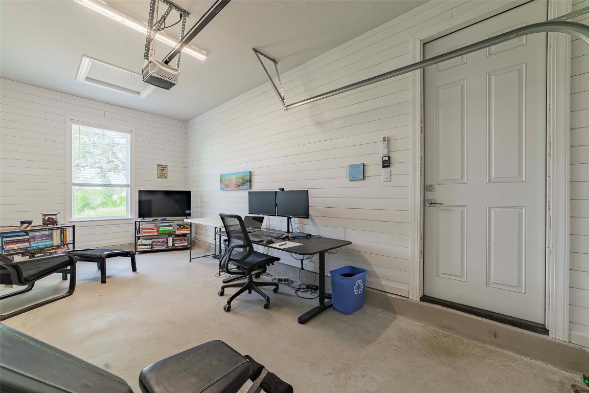 104 Lazy Oak Place Spicewood, TX 78669 - Photo 5 of 40 a workspace with furniture
