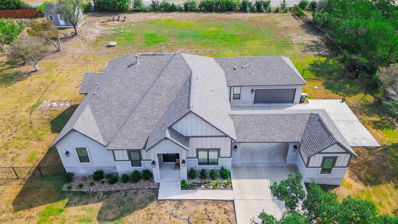 104 Lazy Oak Place Spicewood, TX 78669 - Photo 10 of 40 an aerial view of a house