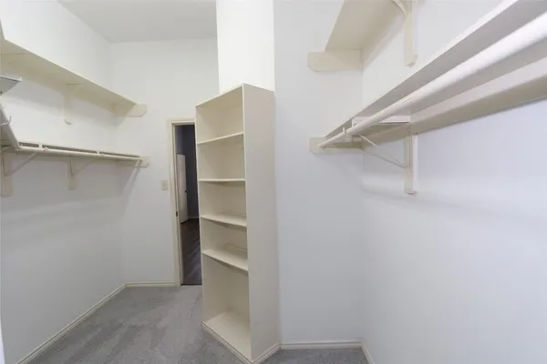 a bathroom with a sink toilet and mirror