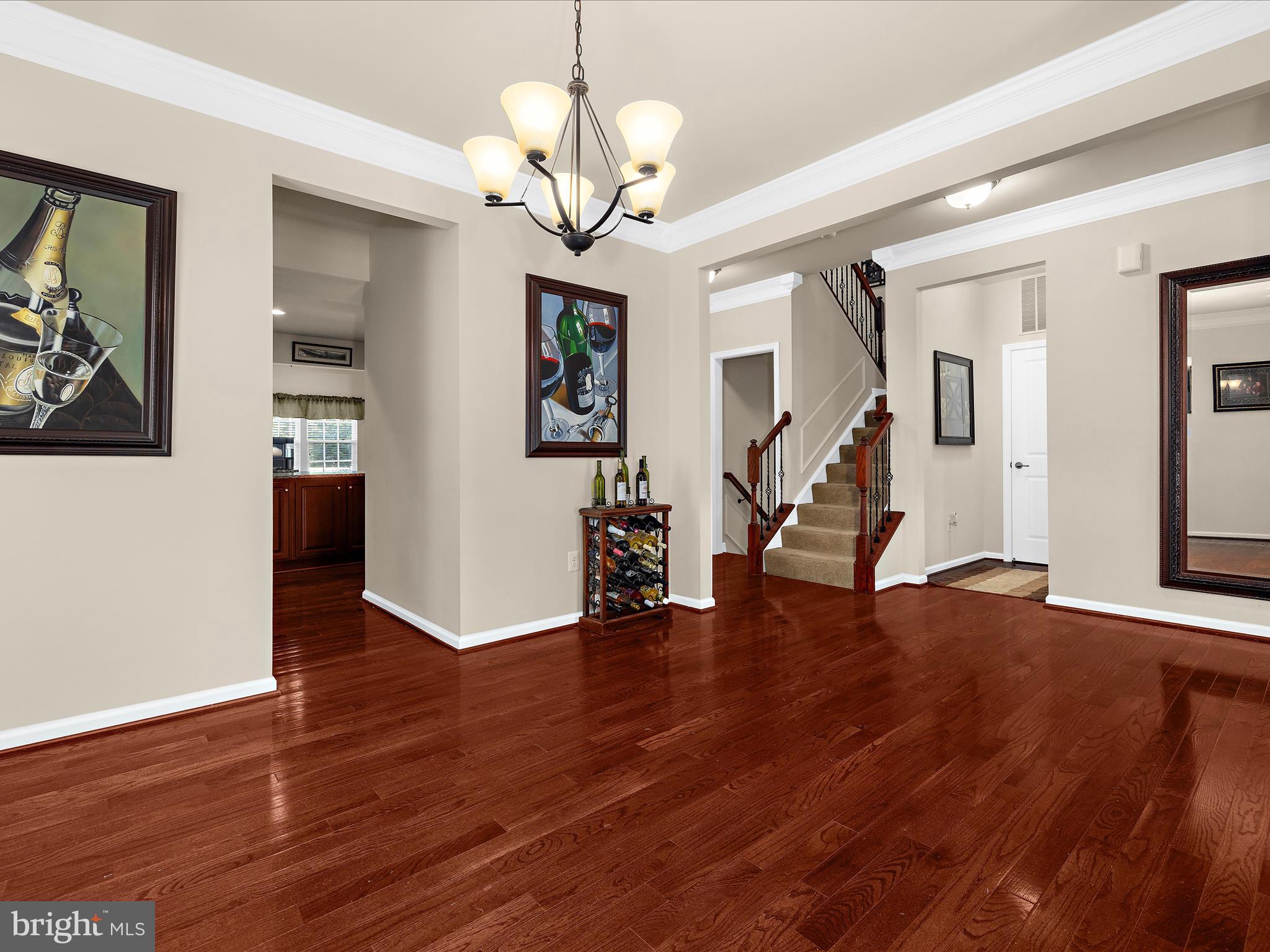 3314 Rosary Court Abingdon, MD 21009 - Photo 12 of 87 a view of a livingroom with wooden floor and stairs
