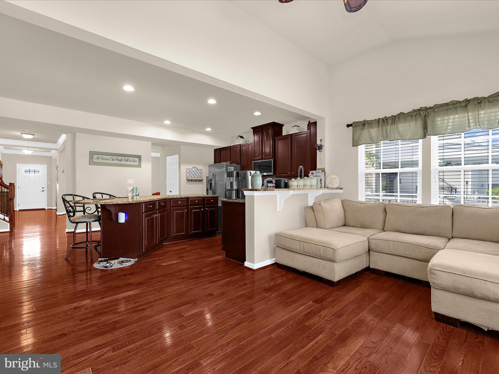 3314 Rosary Court Abingdon, MD 21009 - Photo 23 of 87 a living room with furniture and kitchen view with wooden floor