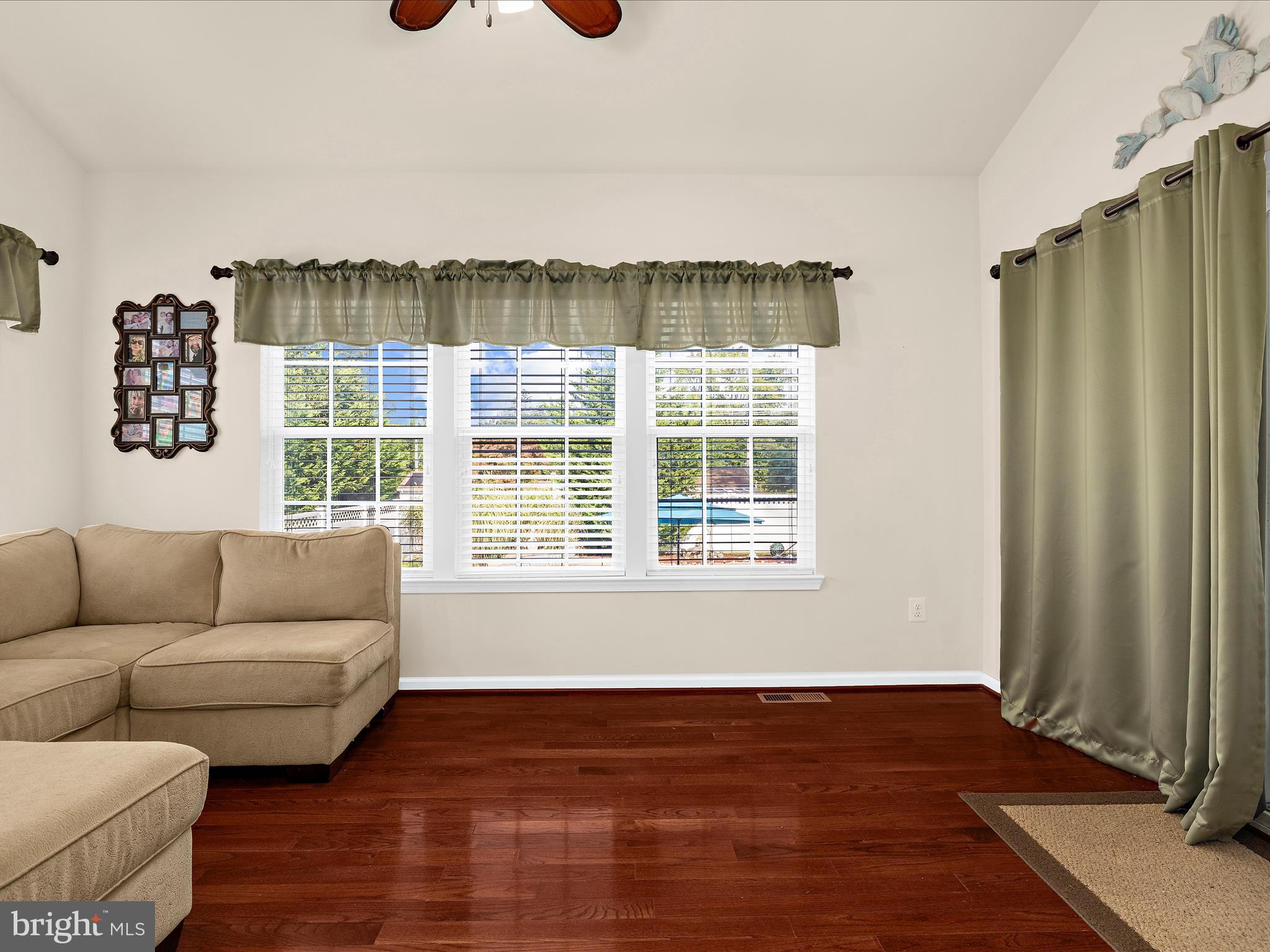 3314 Rosary Court Abingdon, MD 21009 - Photo 24 of 87 a living room with furniture and a floor to ceiling window