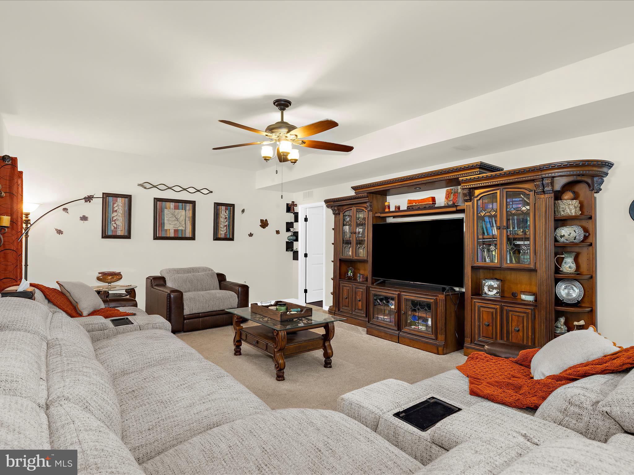 3314 Rosary Court Abingdon, MD 21009 - Photo 26 of 87 a living room with furniture and a flat screen tv