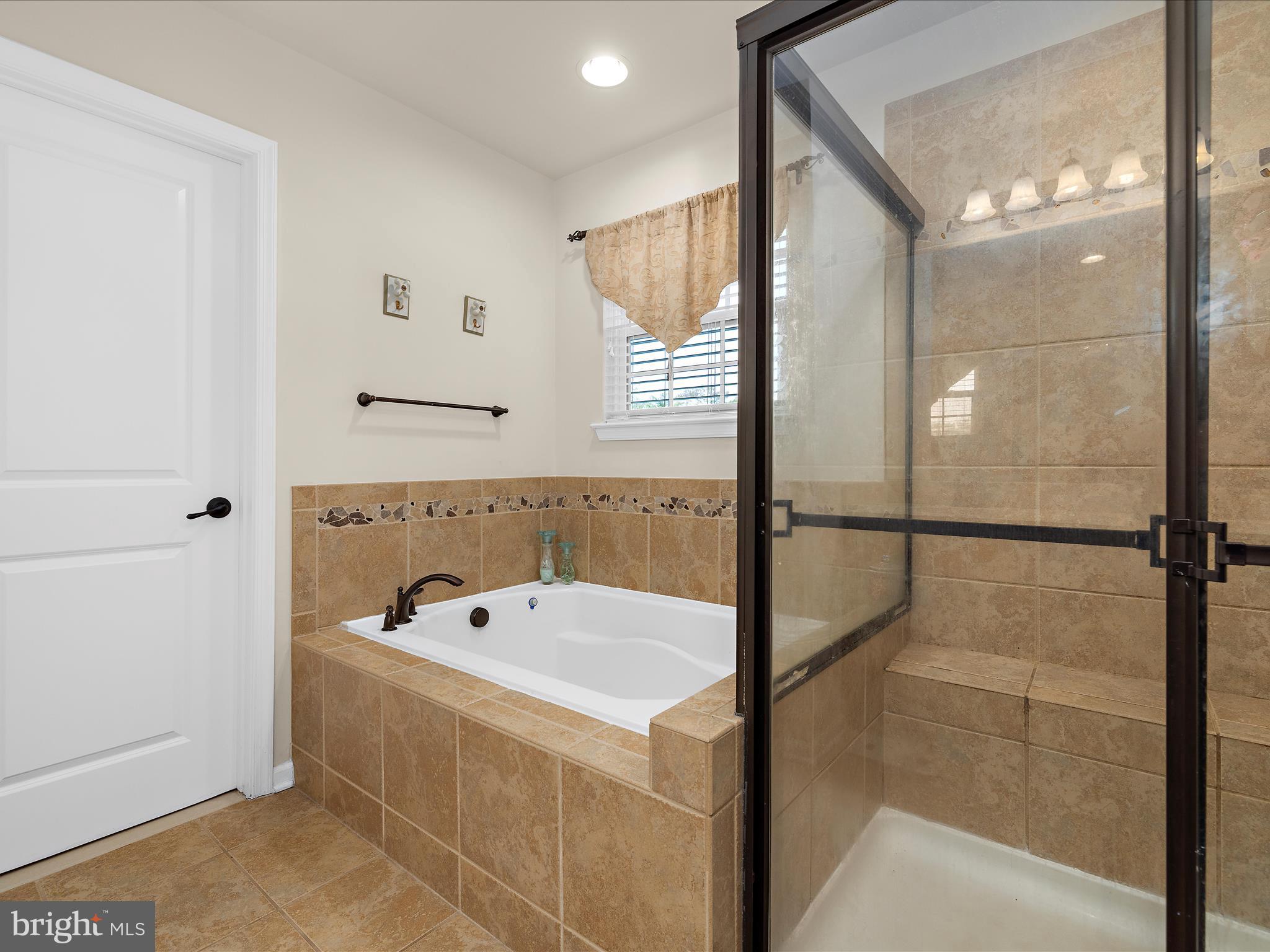 3314 Rosary Court Abingdon, MD 21009 - Photo 35 of 87 a bathroom with a tub and a shower