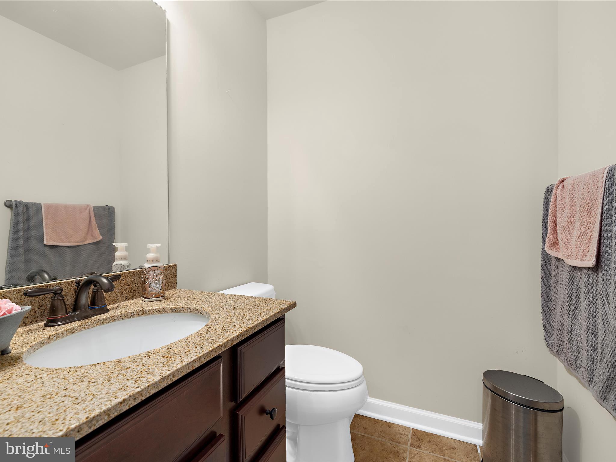 3314 Rosary Court Abingdon, MD 21009 - Photo 55 of 87 a bathroom with a granite countertop sink and a mirror