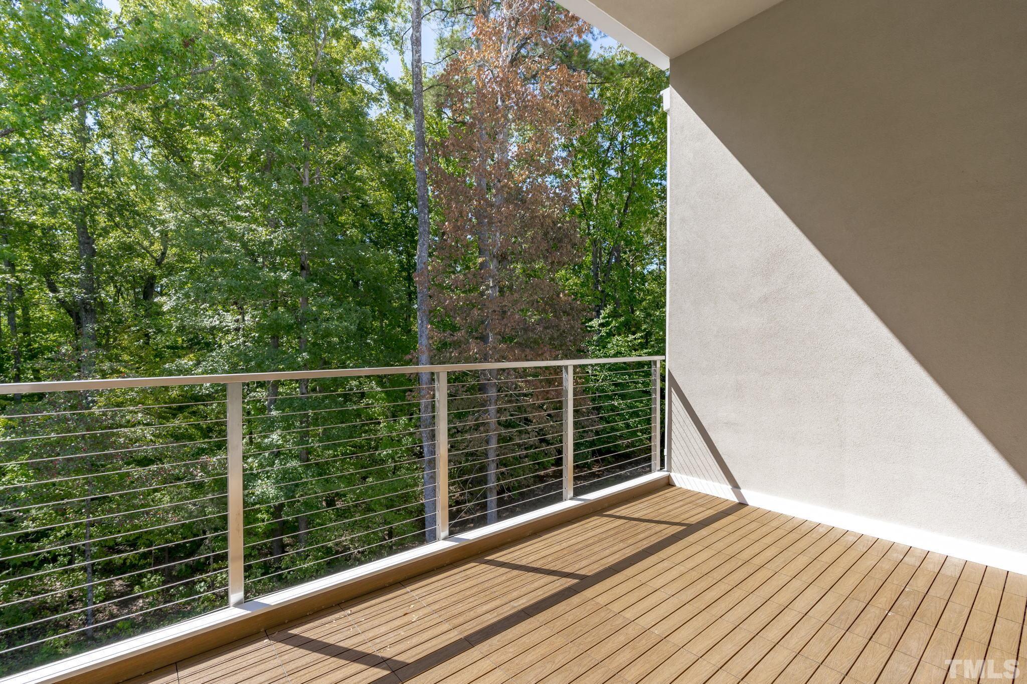 4009 Southpoint Landing Way, Unit 5 Durham, NC 27707 - Photo 18 of 43 a view of balcony with wooden floor