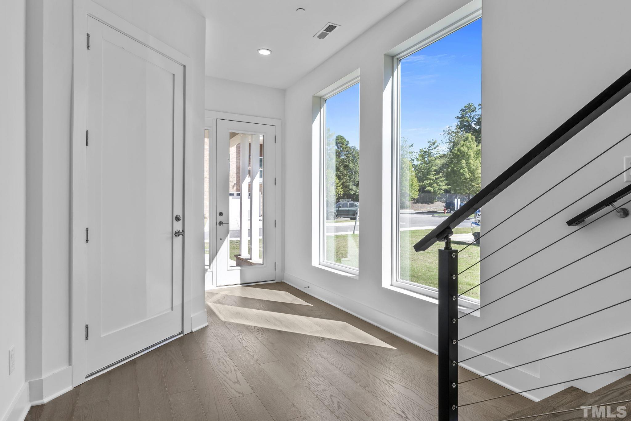 4009 Southpoint Landing Way, Unit 5 Durham, NC 27707 - Photo 34 of 43 a view of an entryway with wooden floor