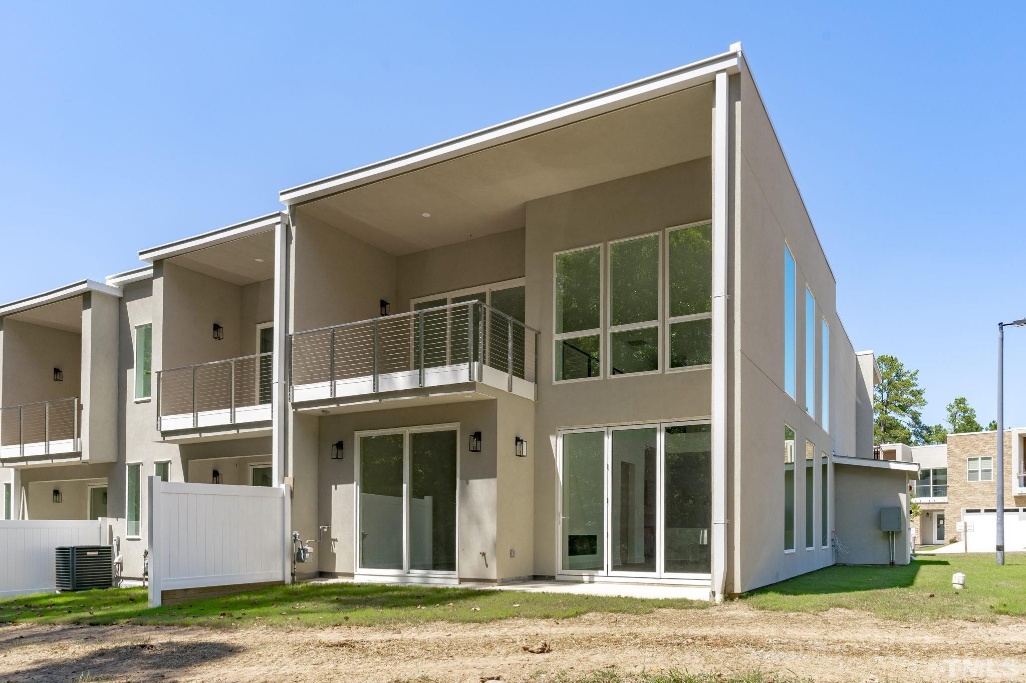4009 Southpoint Landing Way, Unit 5 Durham, NC 27707 - Photo 35 of 43 a view of a house with backyard