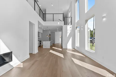 a view of an entryway with wooden floor