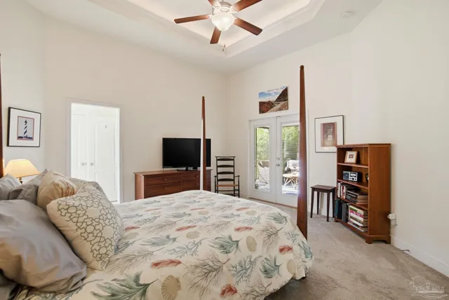 a bathroom with a granite countertop sink a mirror a vanity and a shower