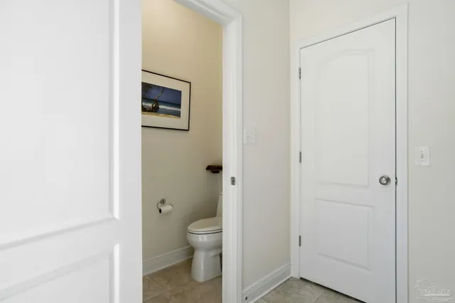 a living room with furniture and a work place