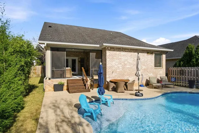 a view of a lake with a house in the background