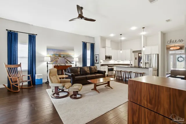 a view of an entryway with wooden floor