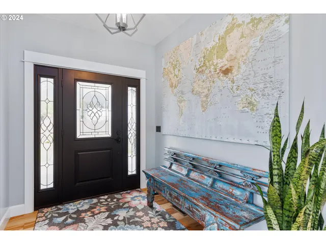 a kitchen with stainless steel appliances granite countertop a stove a sink dishwasher and a refrigerator