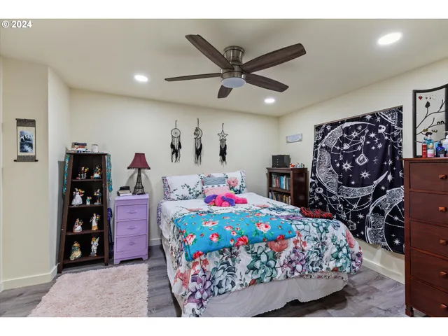 a view of a house with pool and a big yard