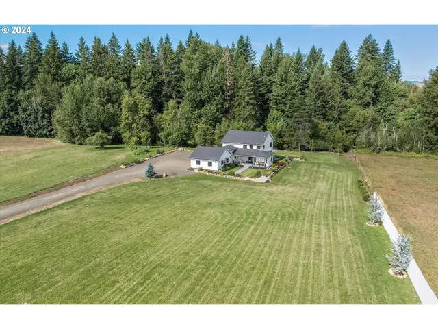 a house view with a garden space