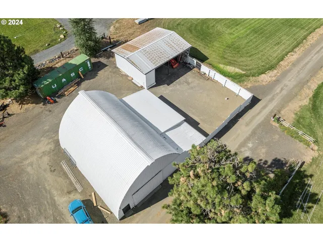 a view of a backyard of a house