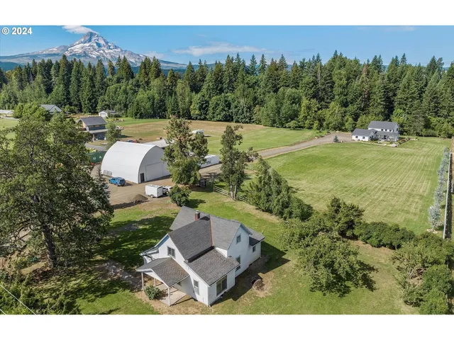a view of a swimming pool with a yard