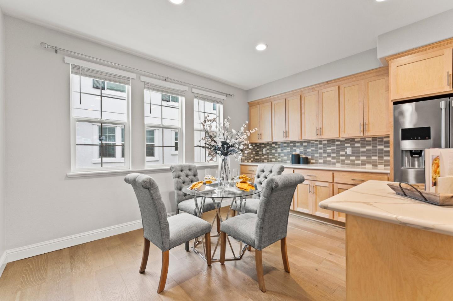 435 Montague Expressway Milpitas, CA 95035 - Photo 14 of 46 a dining room with furniture window and wooden floor