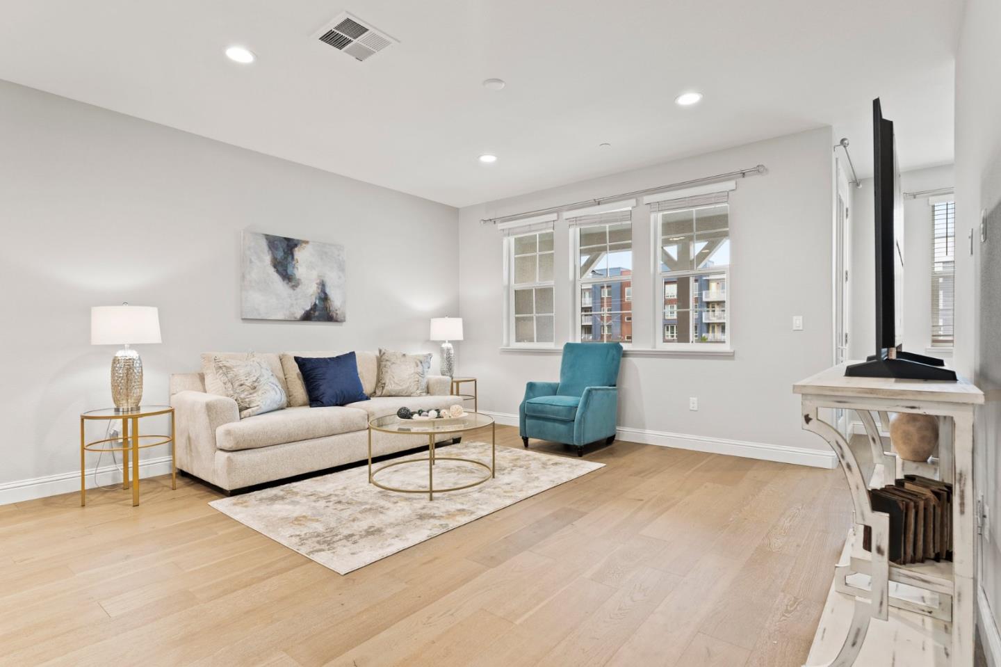 435 Montague Expressway Milpitas, CA 95035 - Photo 18 of 46 a living room with furniture and a fireplace