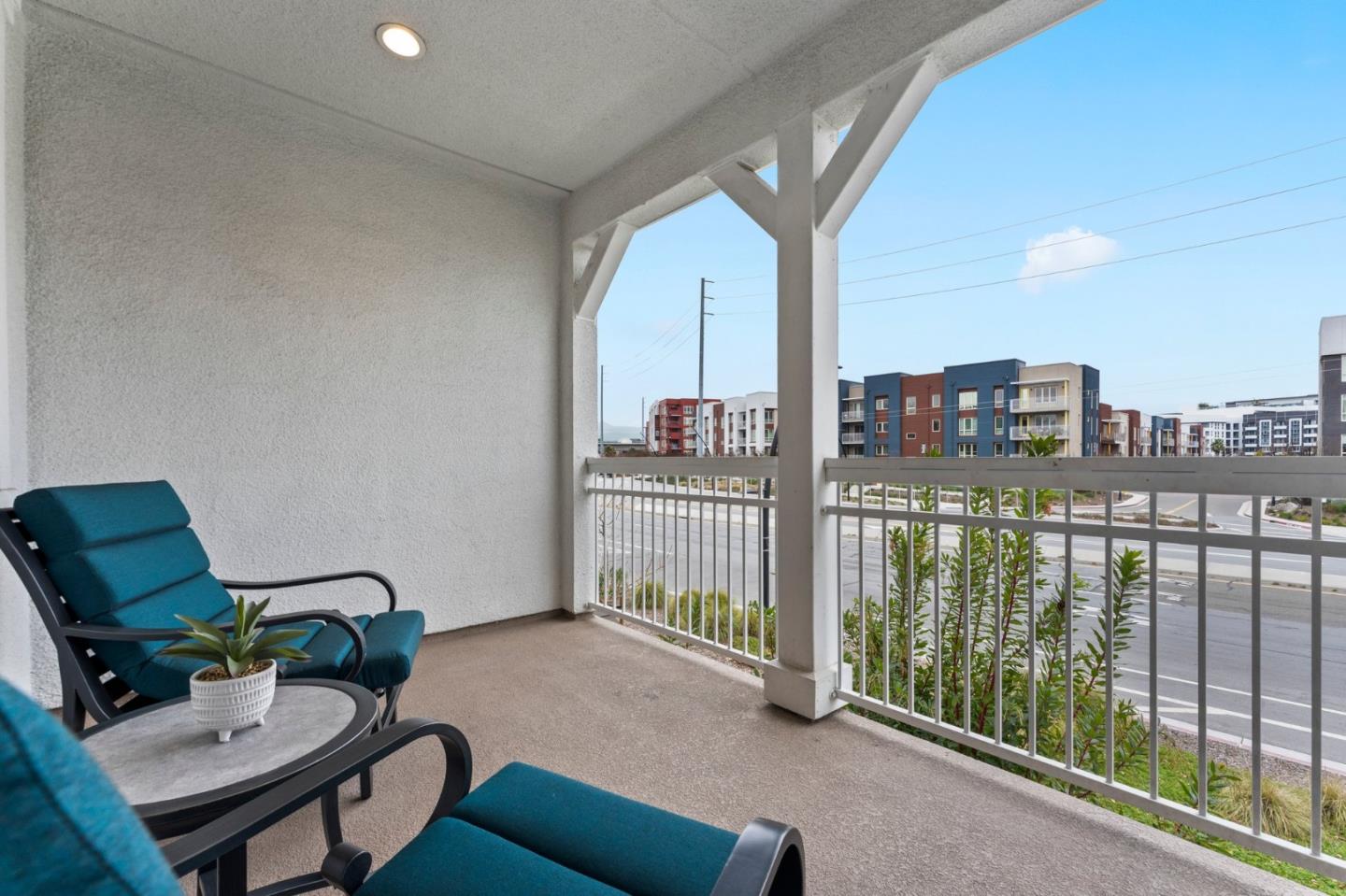 435 Montague Expressway Milpitas, CA 95035 - Photo 20 of 46 a living room with furniture and a floor to ceiling window