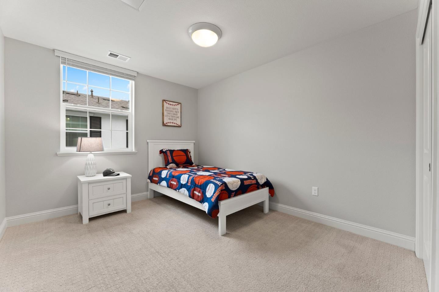 435 Montague Expressway Milpitas, CA 95035 - Photo 25 of 46 a bedroom with a bed and window