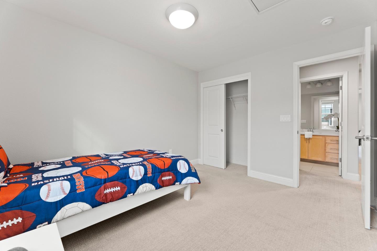 435 Montague Expressway Milpitas, CA 95035 - Photo 26 of 46 a bedroom with a bed and a lamp