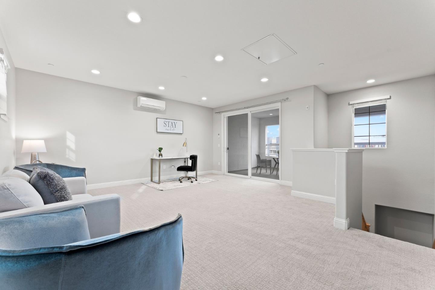 435 Montague Expressway Milpitas, CA 95035 - Photo 34 of 46 a living room with furniture and window