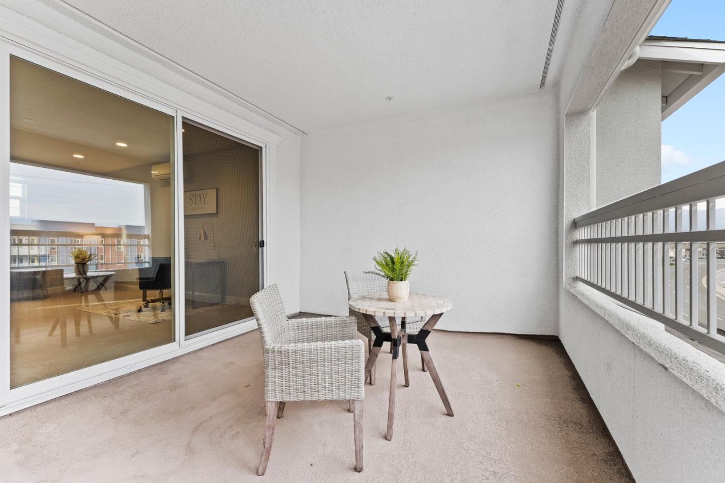 435 Montague Expressway Milpitas, CA 95035 - Photo 38 of 46 a view of a dining room with furniture and floor to ceiling window