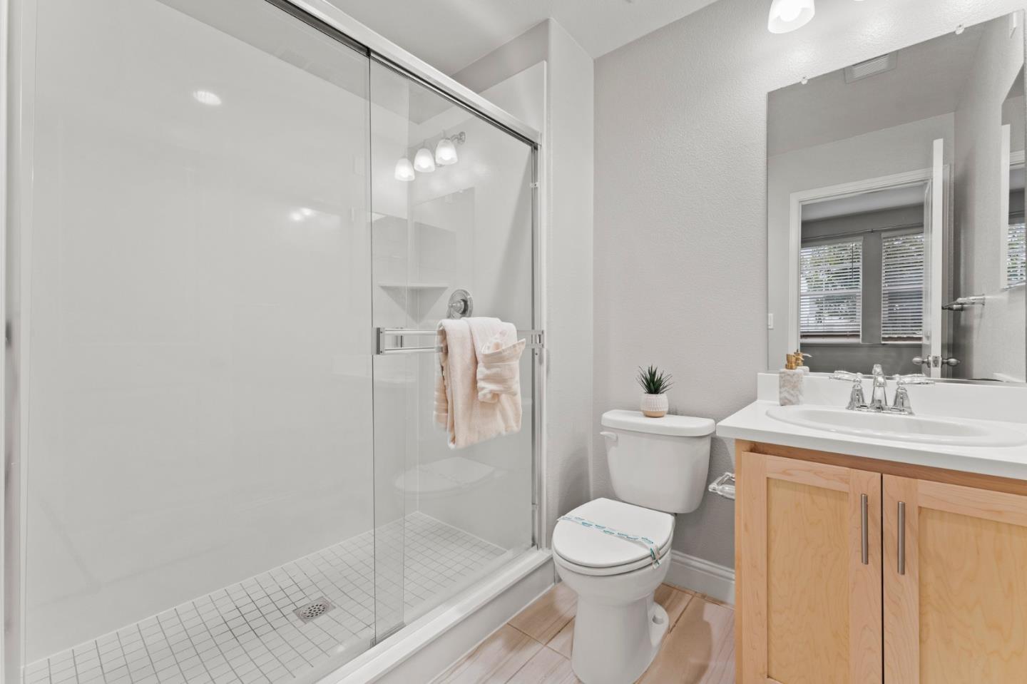 435 Montague Expressway Milpitas, CA 95035 - Photo 7 of 46 a bathroom with a toilet sink and shower