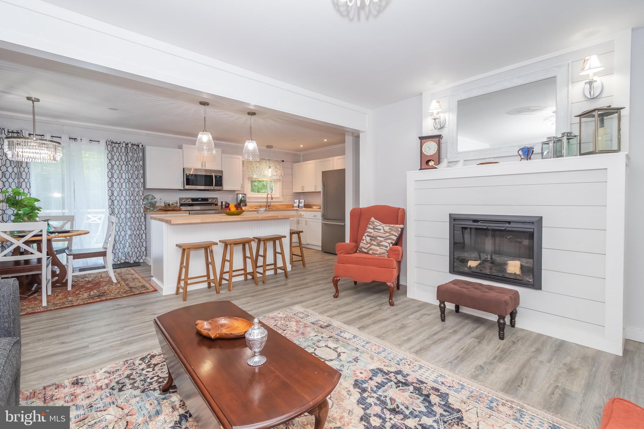 4211 Chestnut Ridge Road Grantsville, MD 21536 - Photo 20 of 43 a living room with furniture and a fireplace