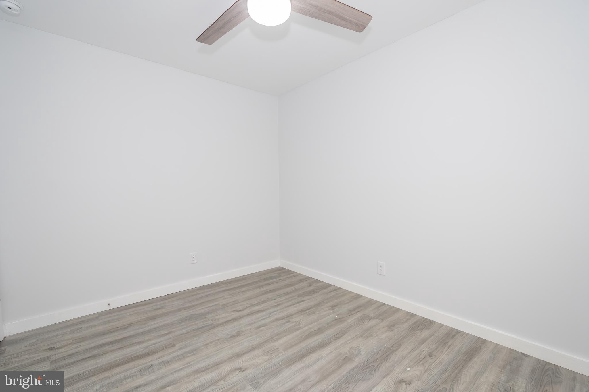 4211 Chestnut Ridge Road Grantsville, MD 21536 - Photo 28 of 43 a view of an empty room with wooden floor