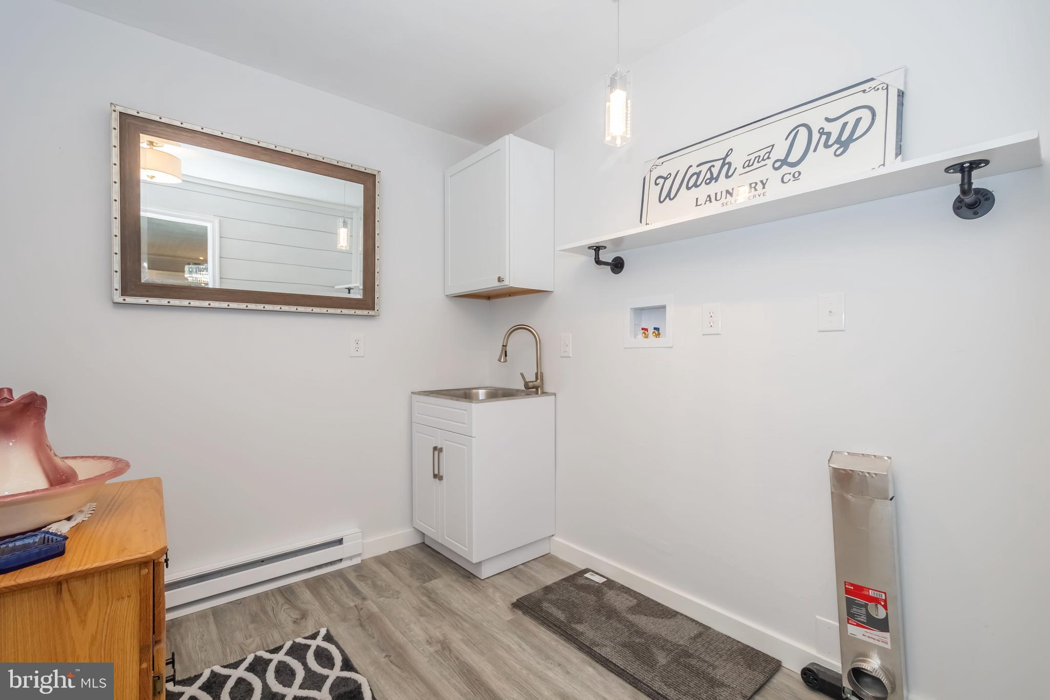 4211 Chestnut Ridge Road Grantsville, MD 21536 - Photo 36 of 43 a room with storage and utility