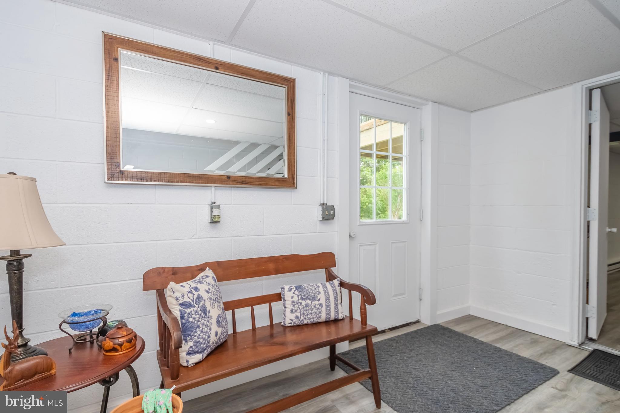 4211 Chestnut Ridge Road Grantsville, MD 21536 - Photo 38 of 43 a bedroom with a bed and wooden floor