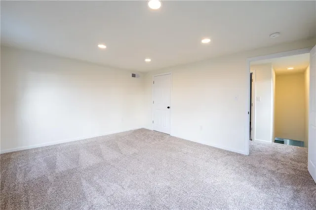 an empty room with an entryway